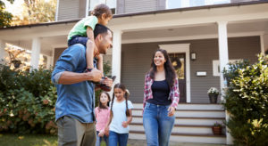 A happy family that just learned how much homeowners insurance they need